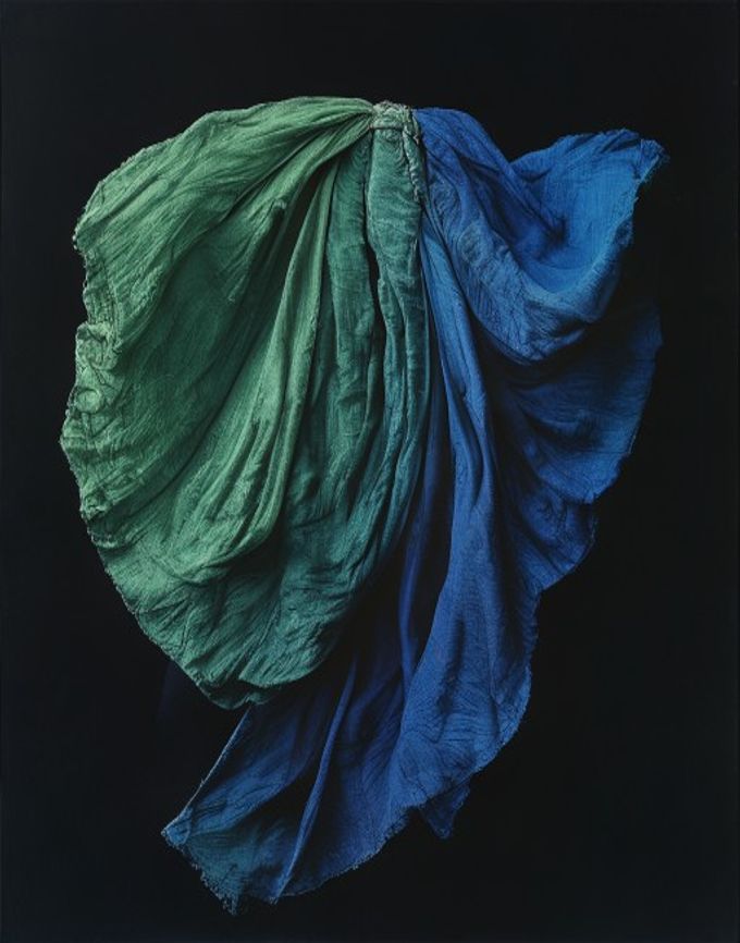 Indigo muffler oxidizing to deep blue